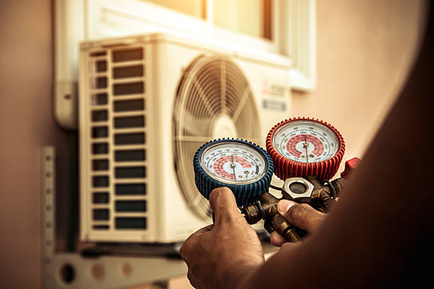 Professional Hvac technician working in Adamsburg, PA